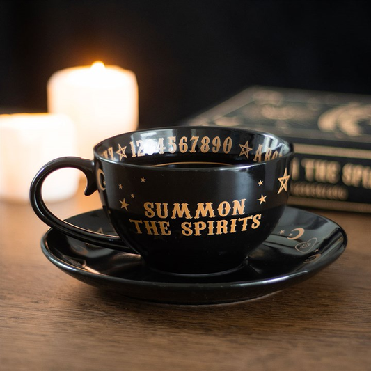 Black Talking Board Teacup and Saucer, image 1 of 6